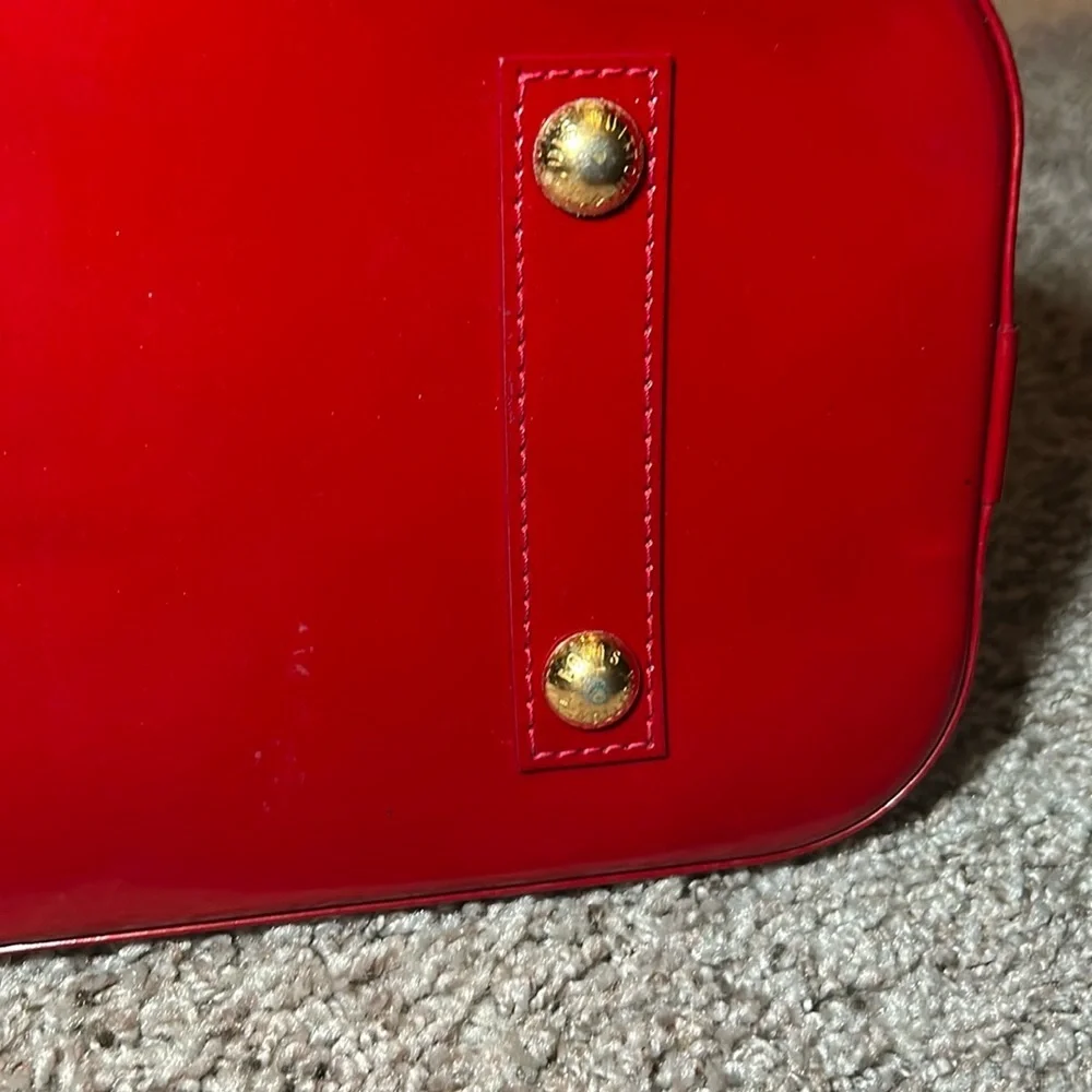 359. Louis Vuitton Red Monogramed Vernis leather Alma